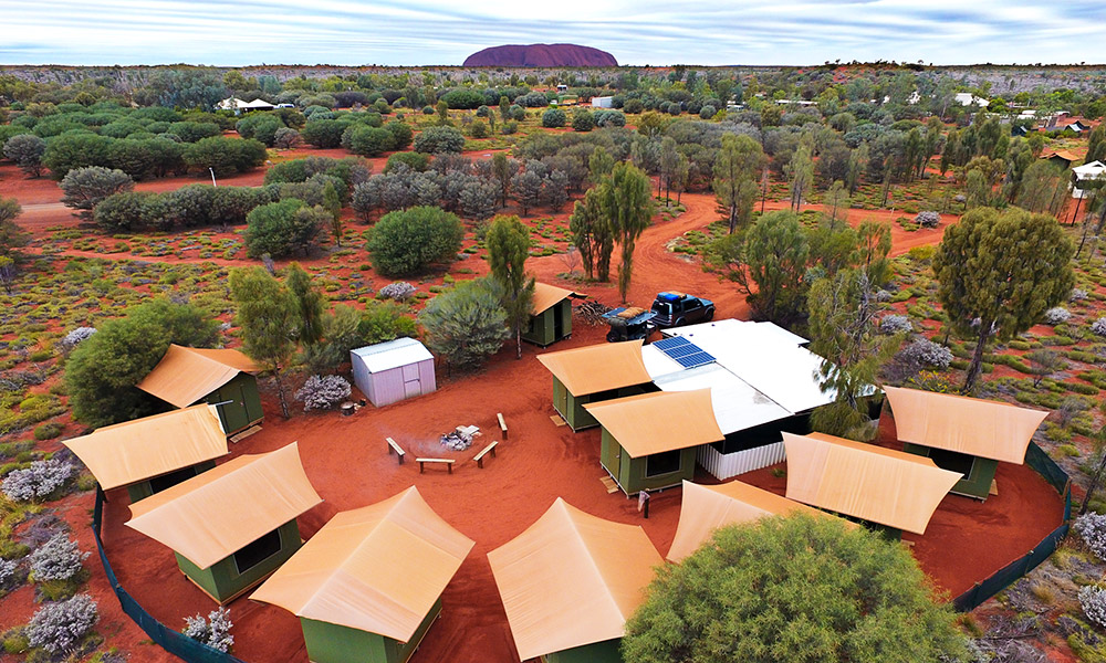 Sleep under the stars in comfortable safari tents with beds