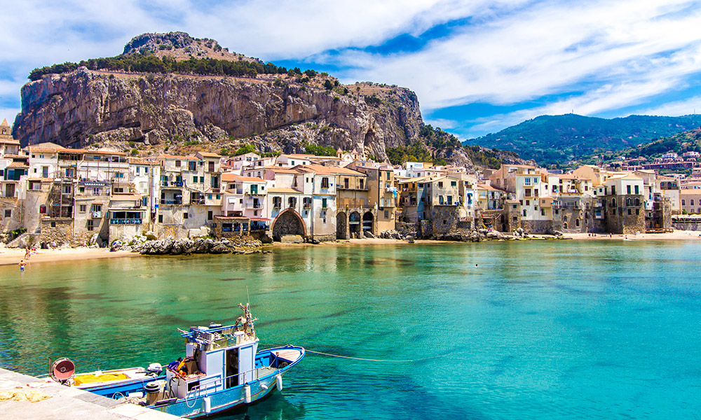 Explore the historical town of Cefalù at leisure