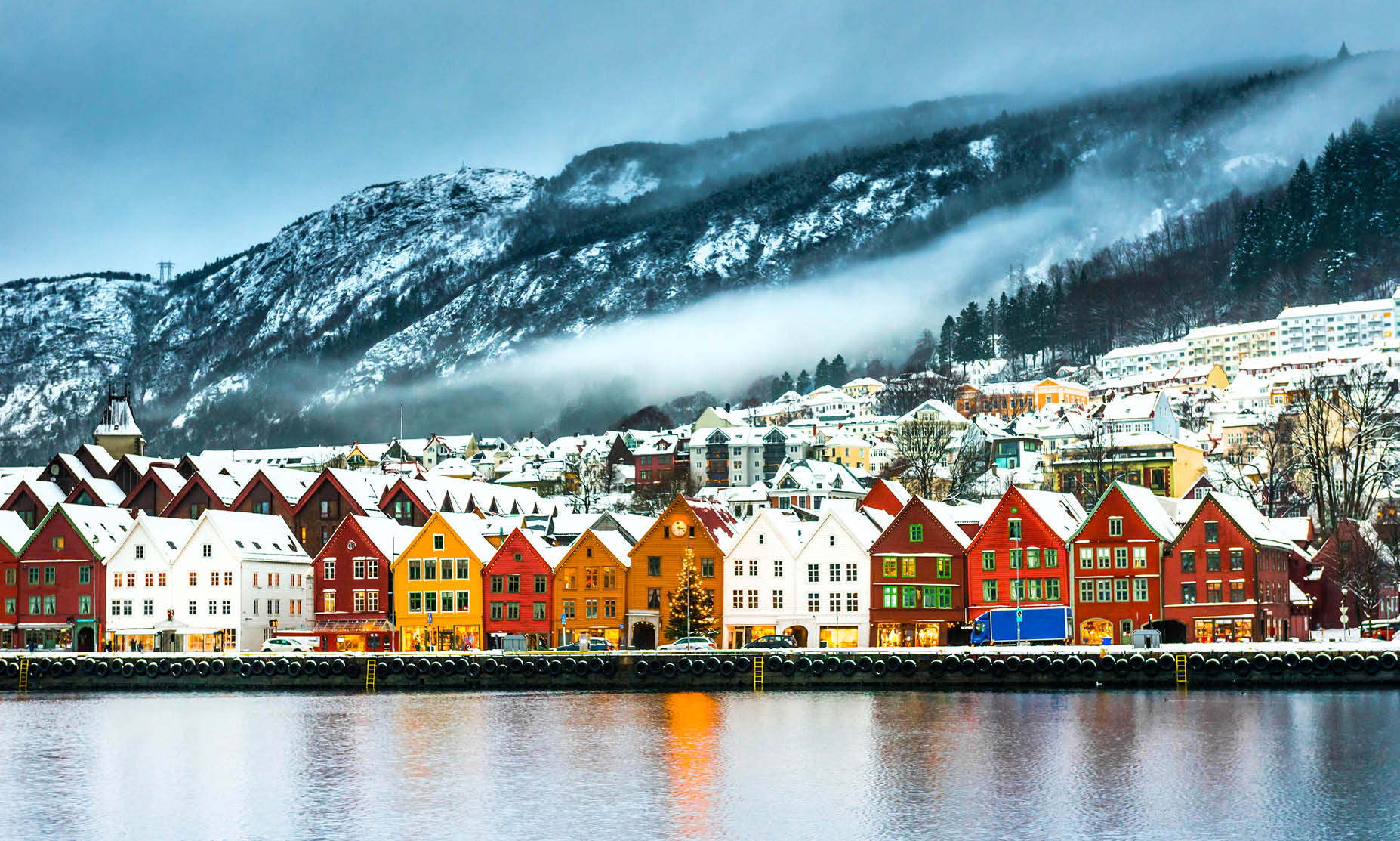 Bryggen street with wooden colored houses in Bergen at Christmas (Norway).