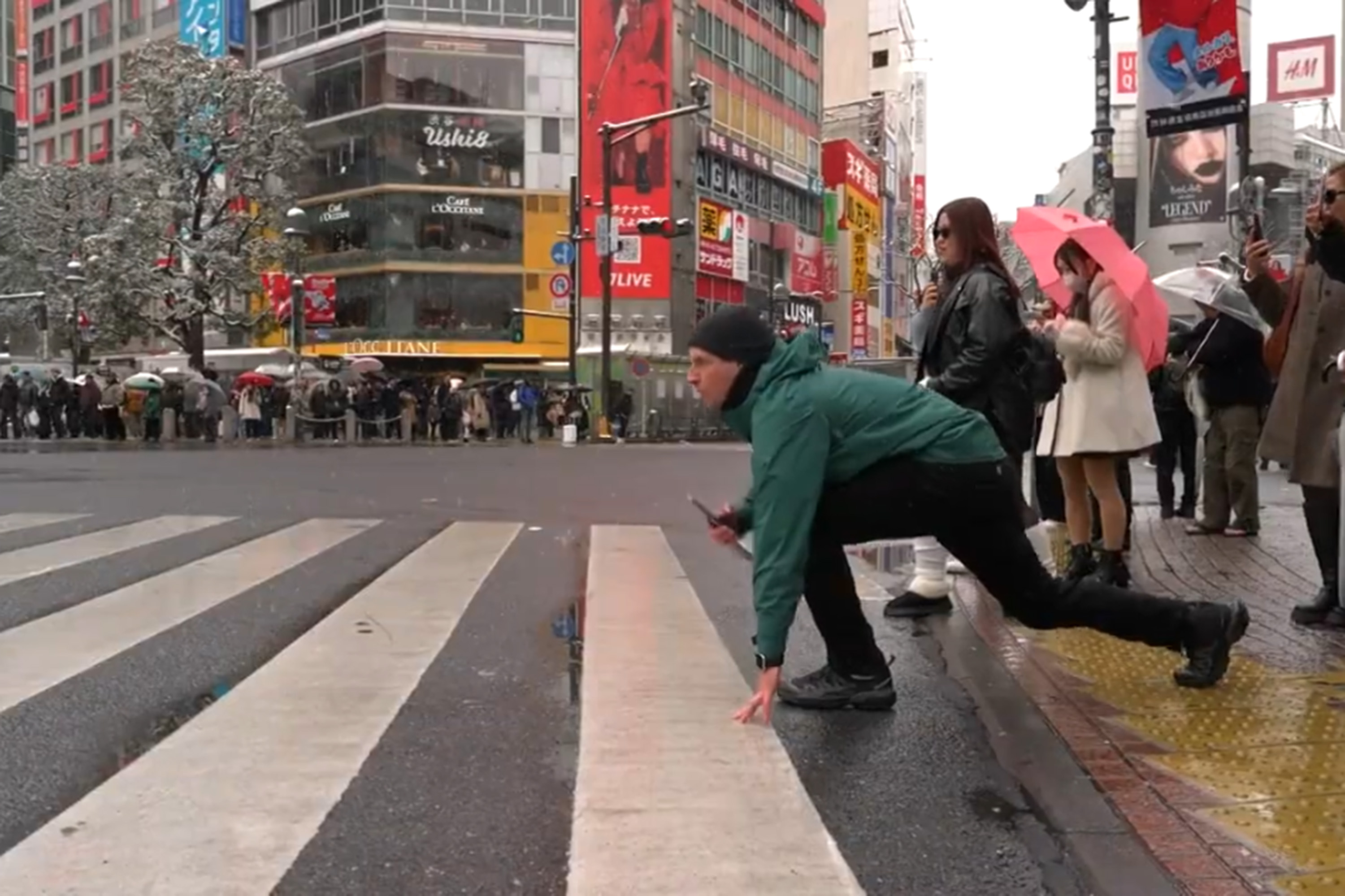 Channel 7’s Sam Mac at Shibuya Crossing in Tokyo.