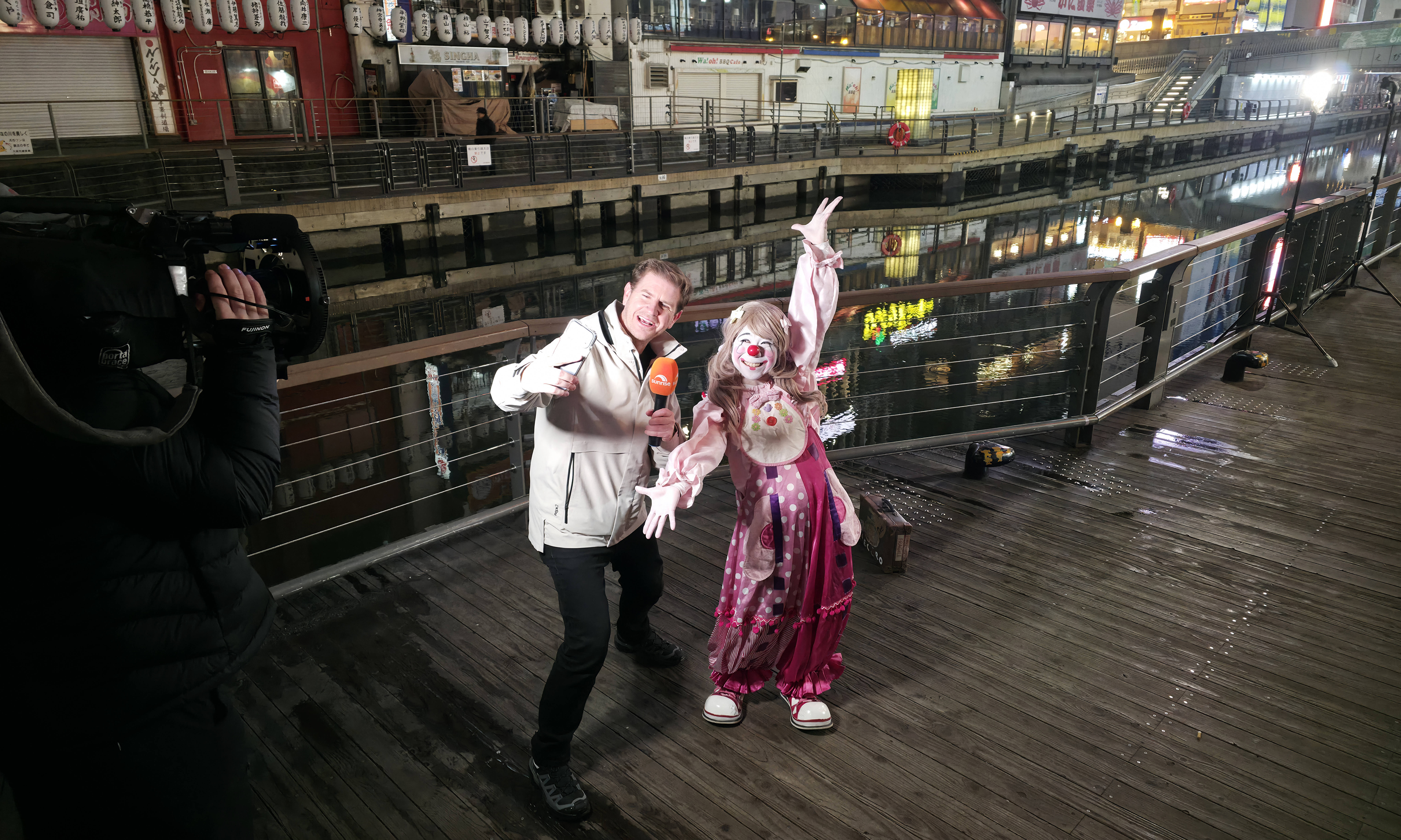 Channel 7's Sam Mac with a Japanese clown, or Piero, in Dotonbori area, Osaka.