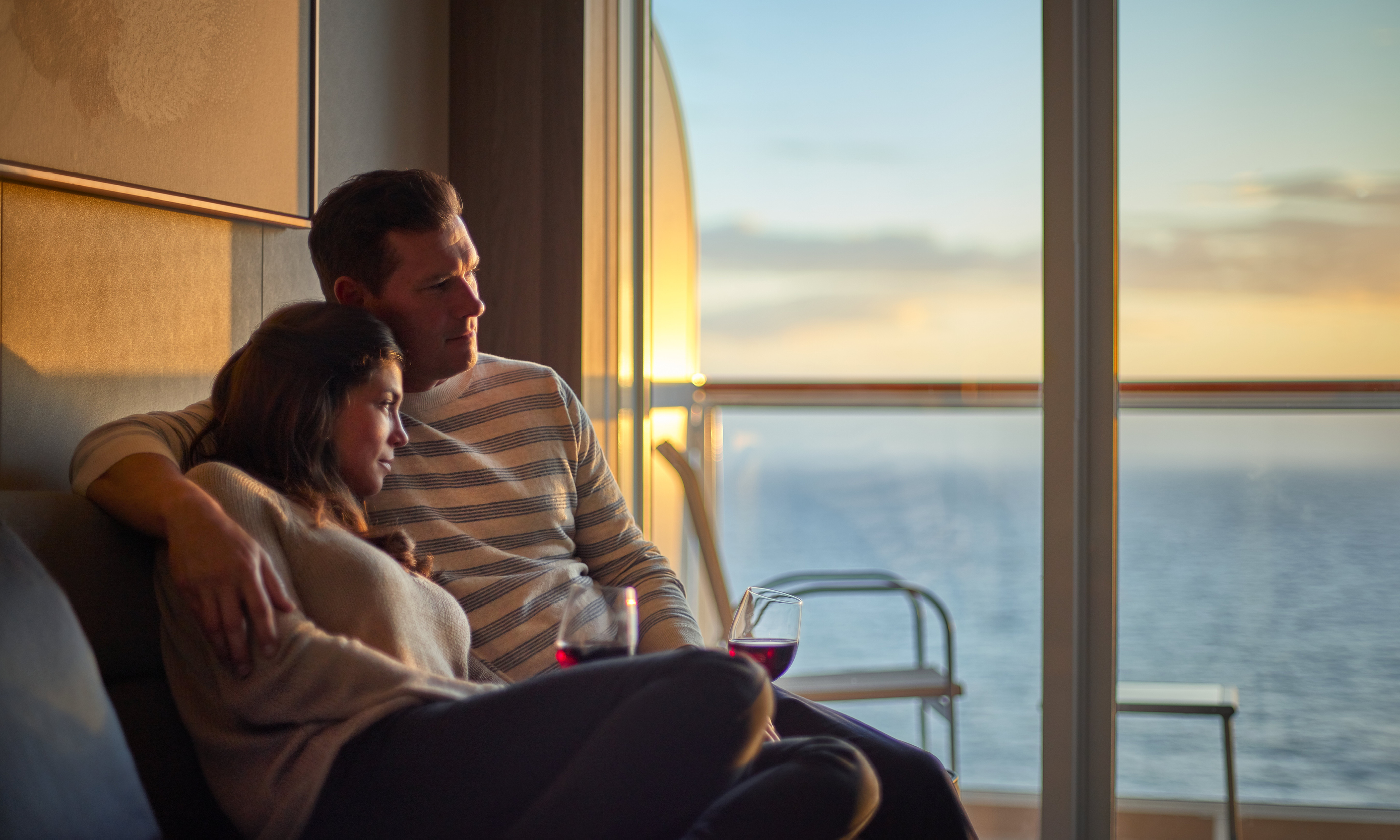 A couple enjoying a romantic moment aboard the NCL 'Bliss'