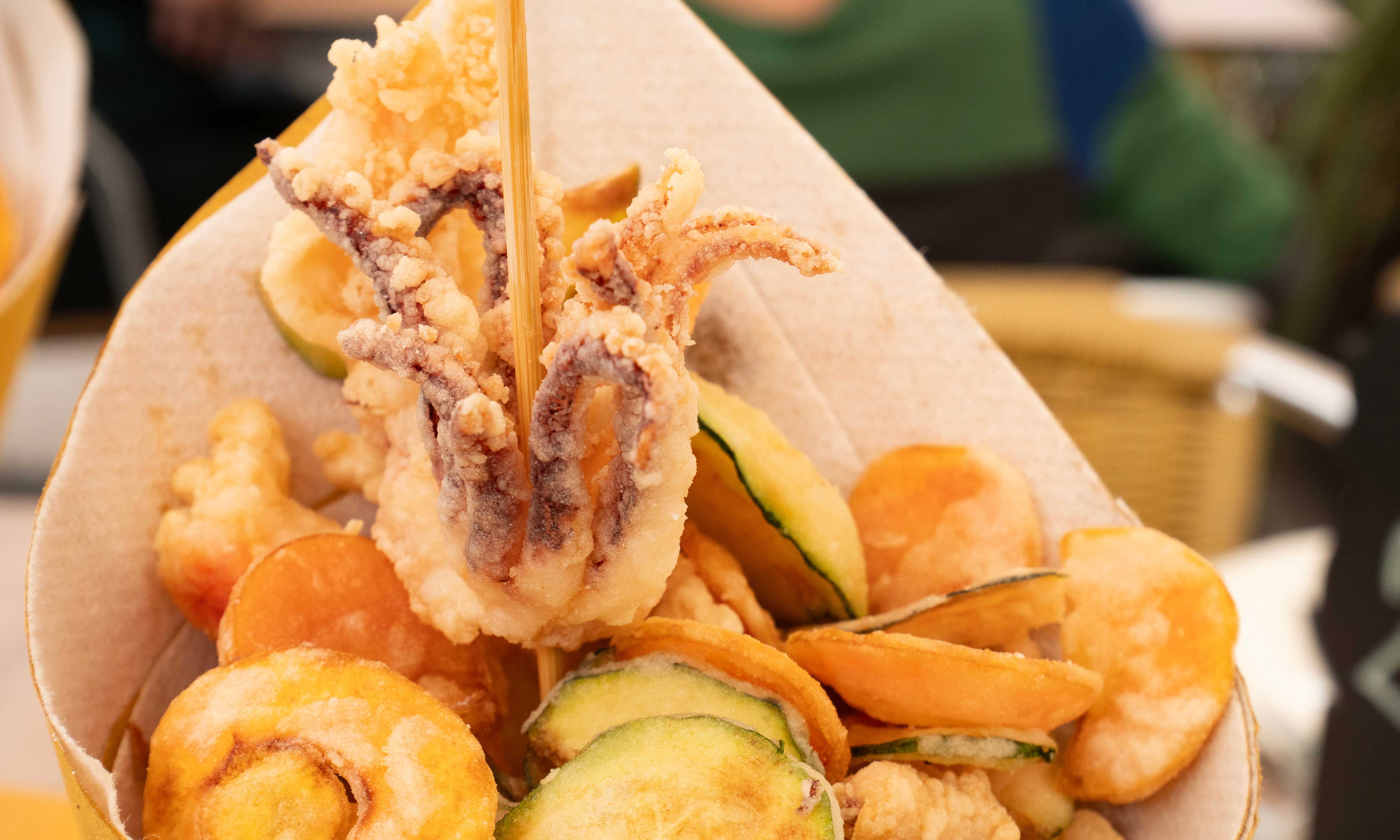 A cone of fritto misto (mixed fried seafood).